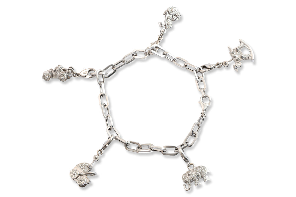 A CHARM BRACELET WITH DETACHABLE DIAMOND-SET CHARMS