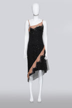 COLLETTE DINNIGAN - A BLACK MESH OVERDRESS WITH SLIP