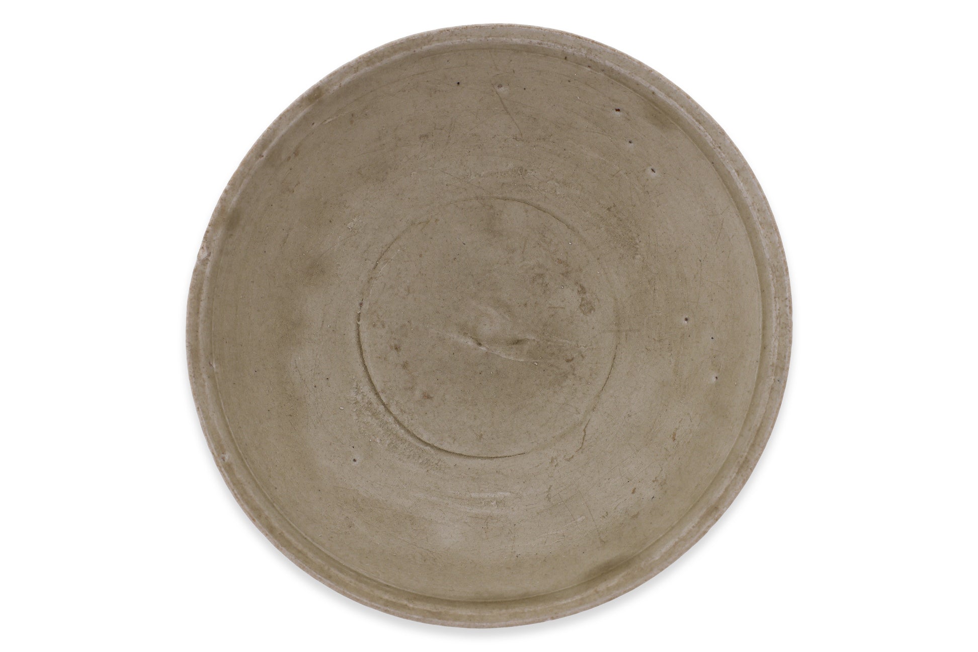 AN OLIVE-GLAZED STONEWARE BOWL