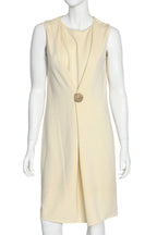 CALVIN KLEIN COLLECTION - A SLEEVELESS DRESS WITH BRONZED MEDALLION DETAIL