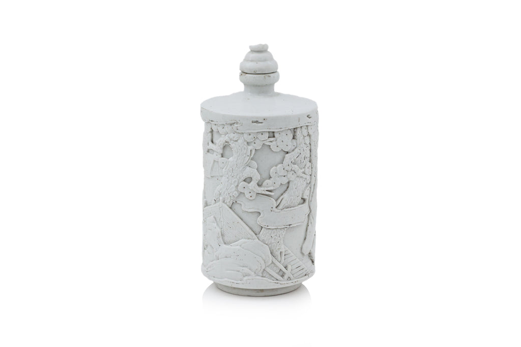 A SMALL WHITE GLAZED PORCELAIN BOTTLE