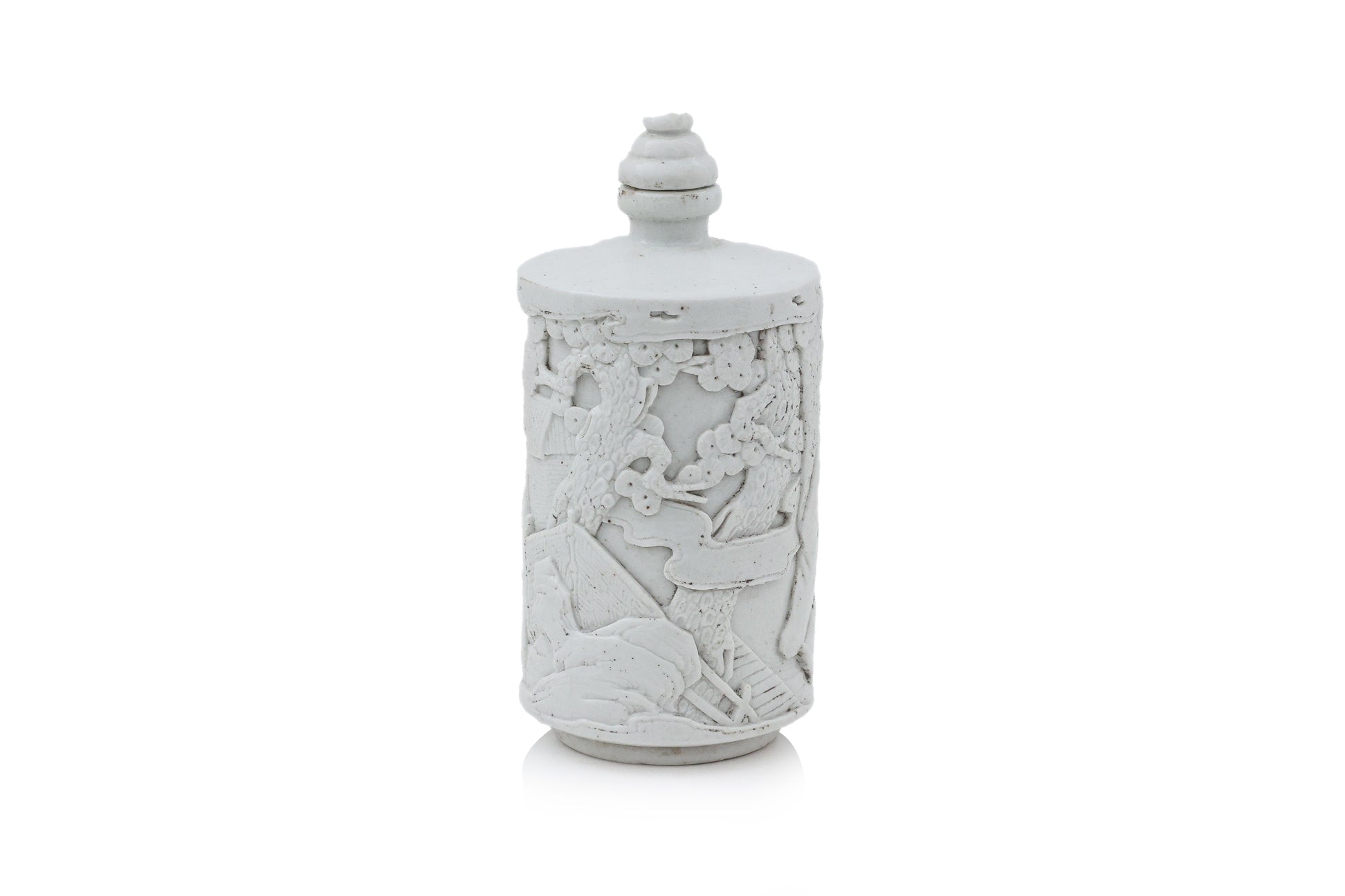 A SMALL WHITE GLAZED PORCELAIN BOTTLE