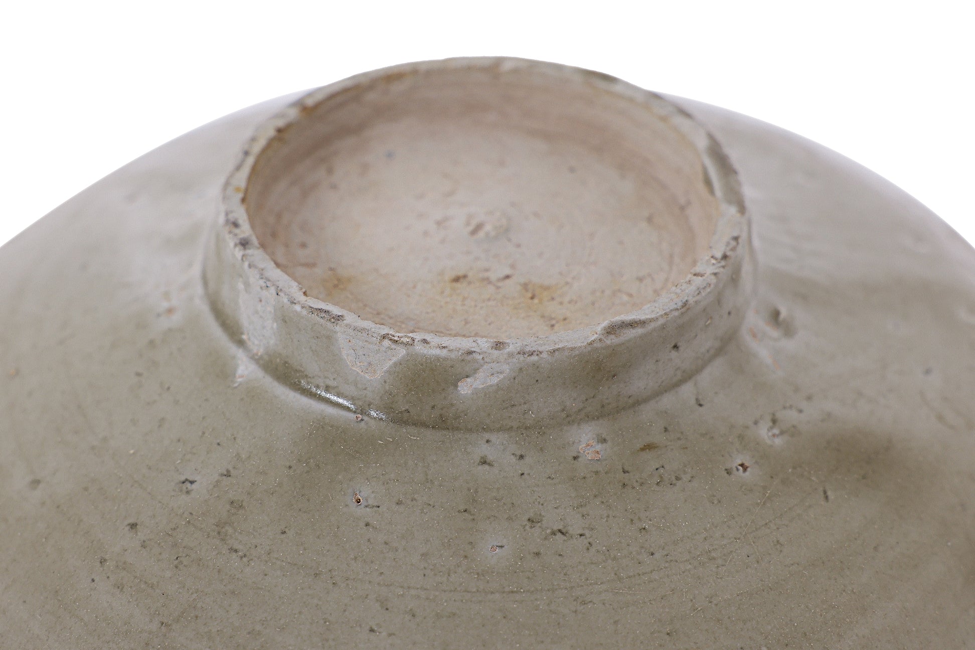 AN OLIVE-GLAZED STONEWARE BOWL