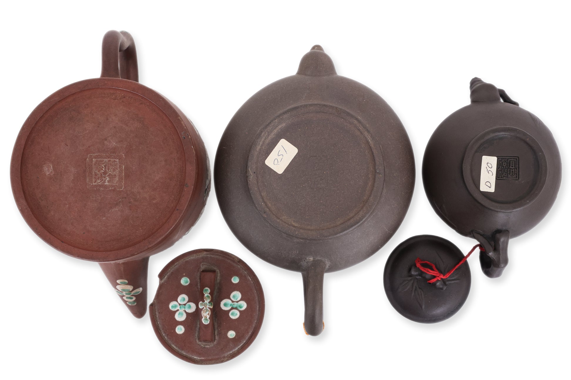 A GROUP OF THREE YIXING POTTERY TEAPOTS