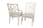 A LARGE EXTENDING OVAL DINING TABLE AND EIGHT CHAIRS