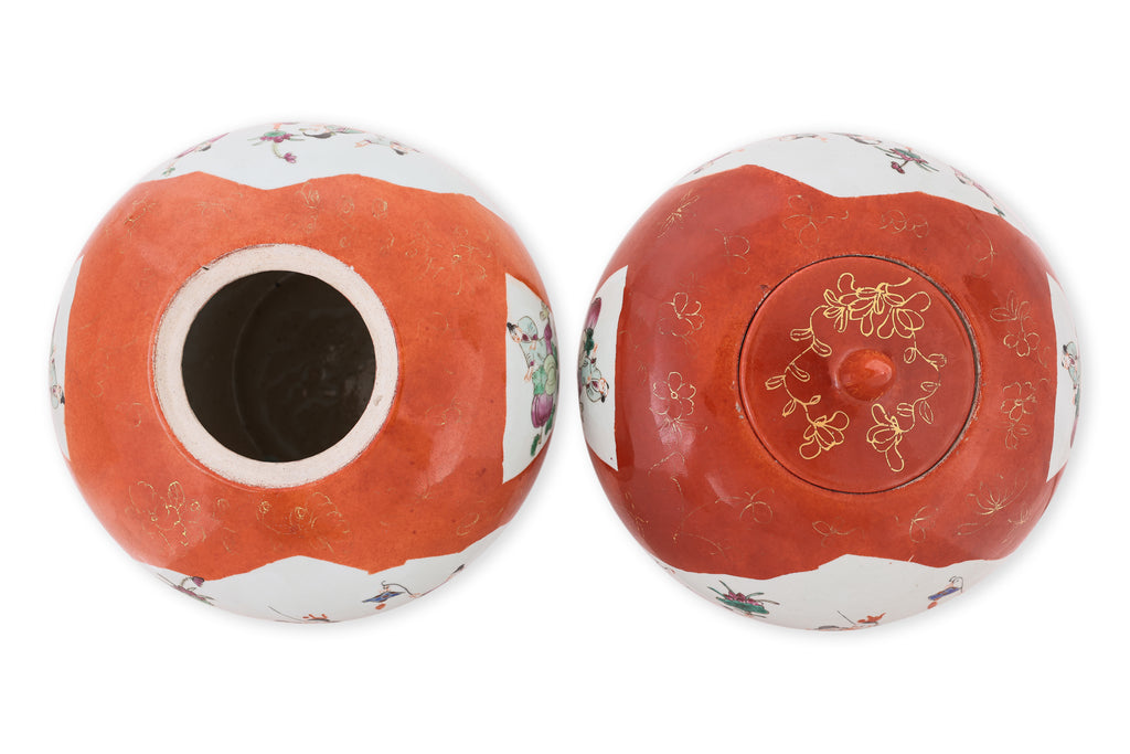 A PAIR OF CORAL GROUND FAMILLE ROSE PORCELAIN JARS