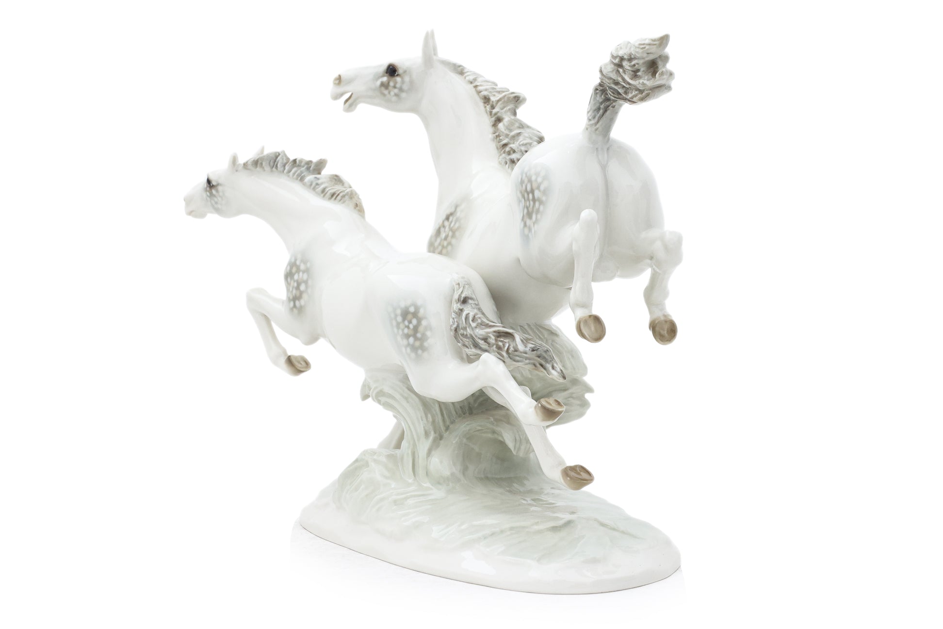A HUTSCHENREUTHER 'IN FREEDOM' HORSES PORCELAIN GROUP