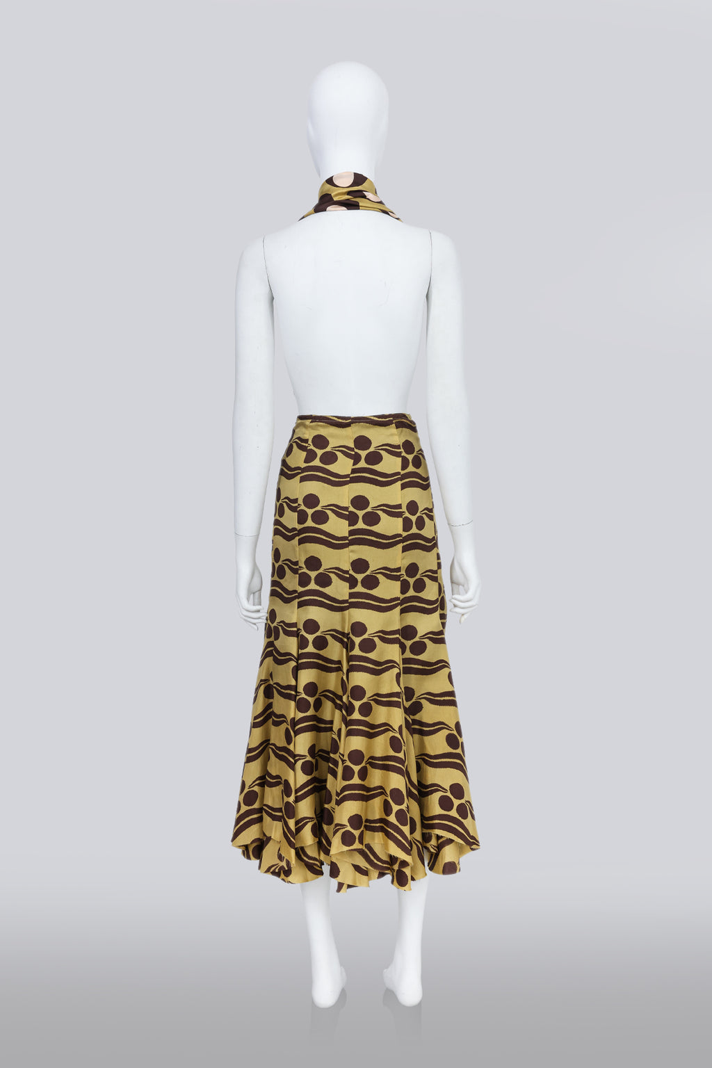 EASTON PEARSON - A LIME PATTERNED SKIRT WITH MATCHING BELT