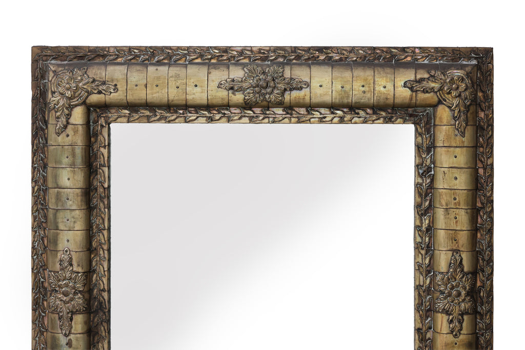 A WHITE METAL FRAMED MIRROR