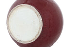 A SANG DE BOEUF GLAZED PORCELAIN VASE