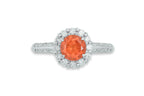 A SPESSARTITE GARNET AND DIAMOND RING BY SEIKO