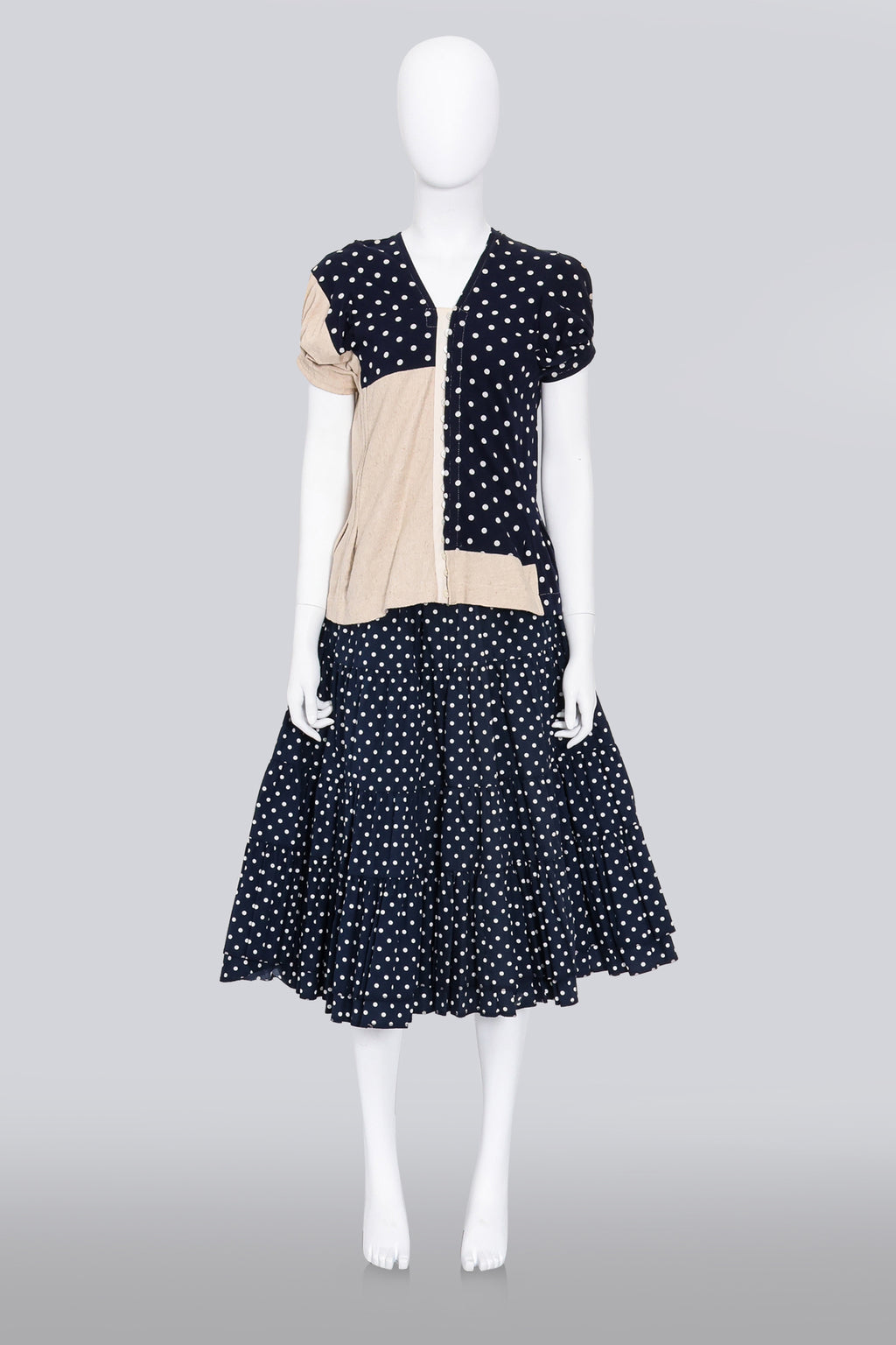 COMME DES GARCONS - A 2007 NAVY AND CREAM MULTI-PANEL POLKA DOT BLOUSE AND MATCHING SKIRT SET