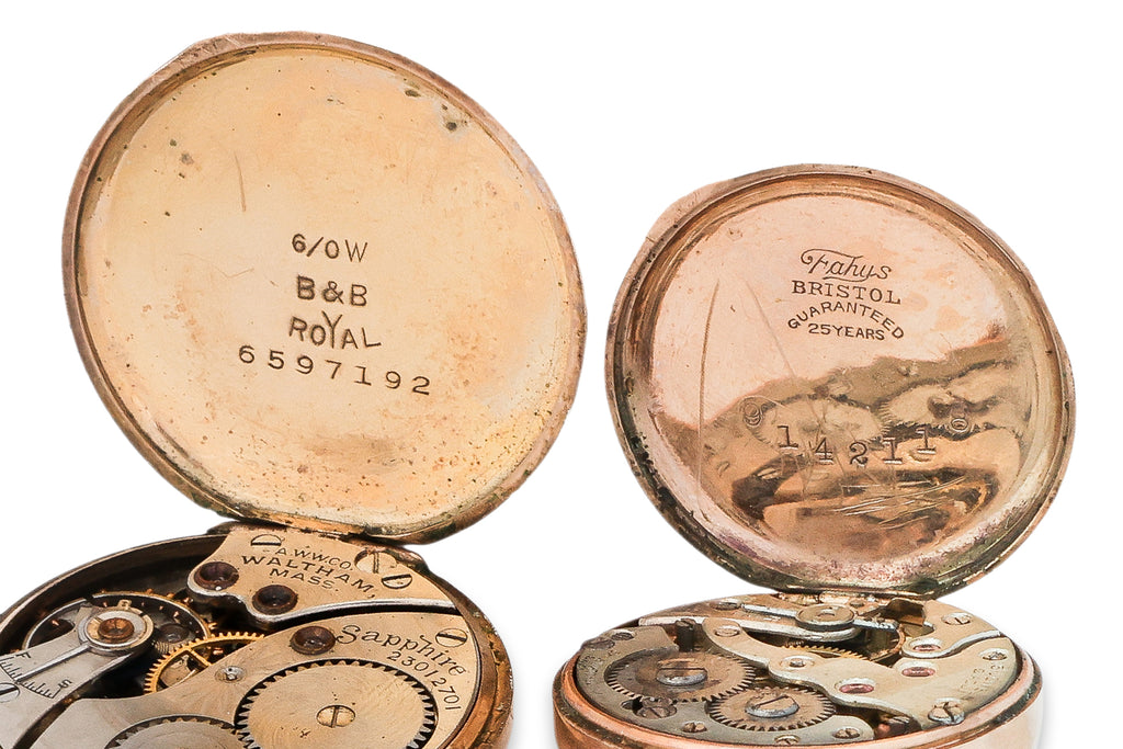 A GROUP OF FOUR PENDANT WATCHES