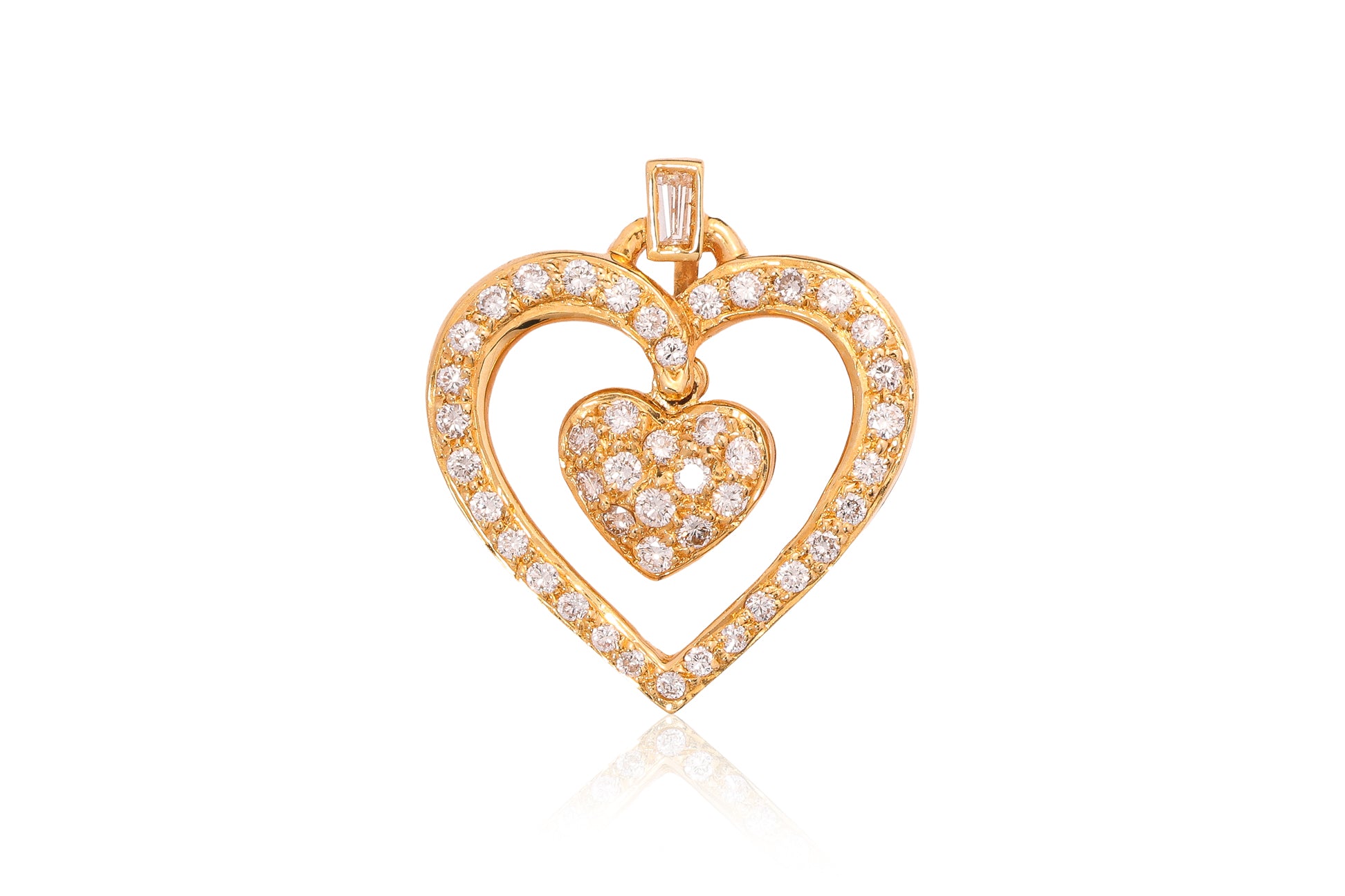 A HIGH KARAT GOLD DIAMOND 'DOUBLE HEART' PENDANT