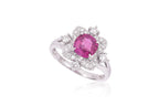 AN UNHEATED BURMESE RUBY AND DIAMOND CLUSTER RING