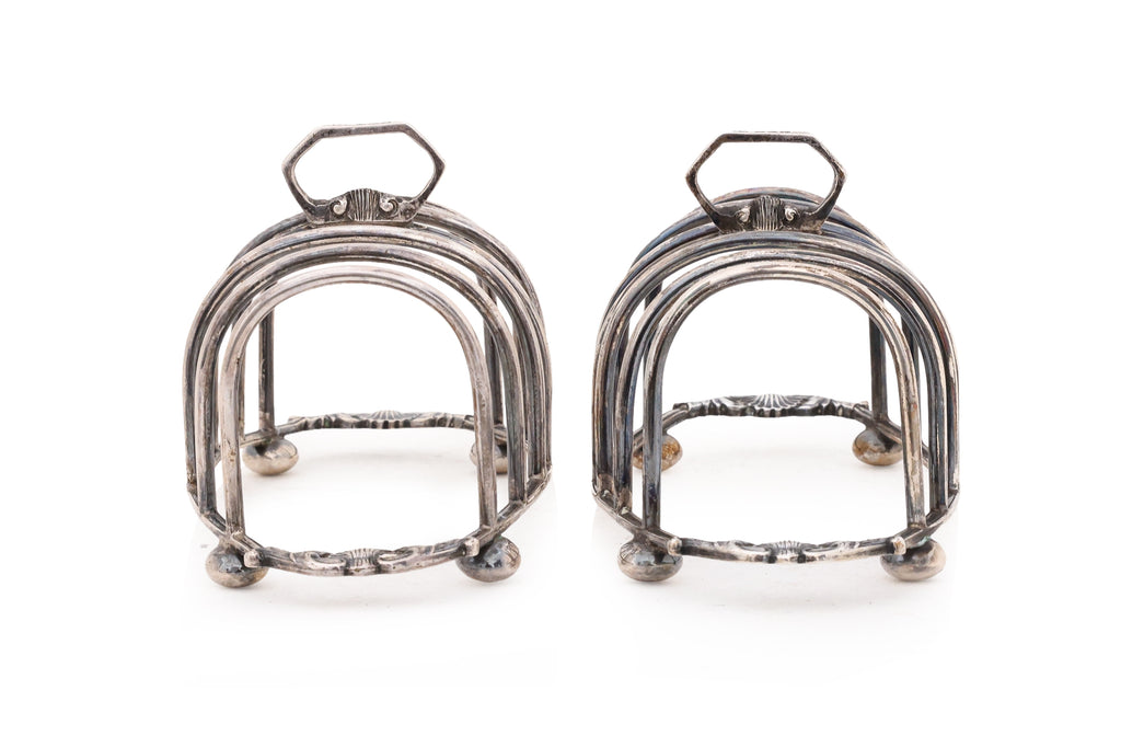 A PAIR OF ENGLISH STERLING SILVER TOAST RACKS