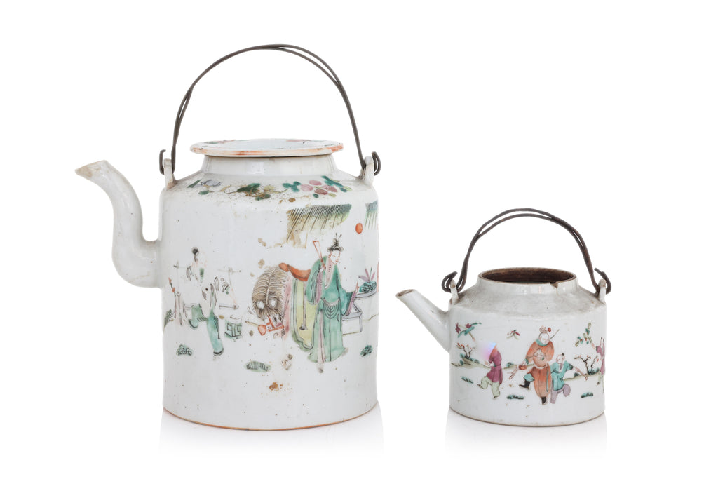 A GROUP OF FOUR FAMILLE ROSE PORCELAIN TEAPOTS