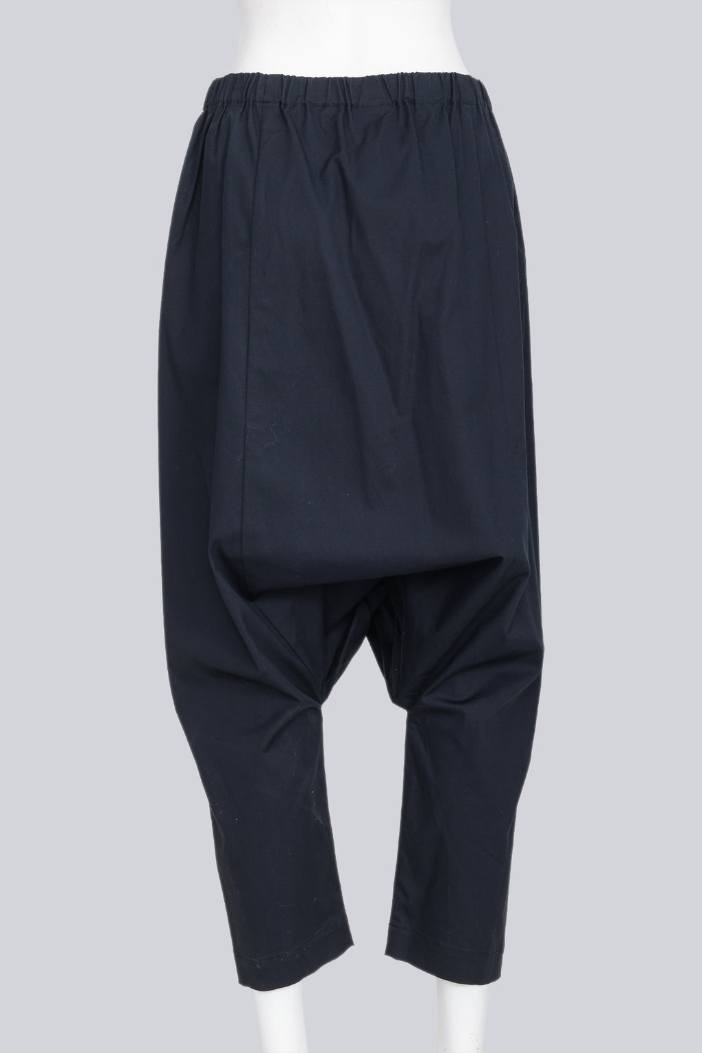 COMME DES GARCONS - A PAIR OF 2014 COTTON BLEND NAVY DROP CROTCH TROUSERS