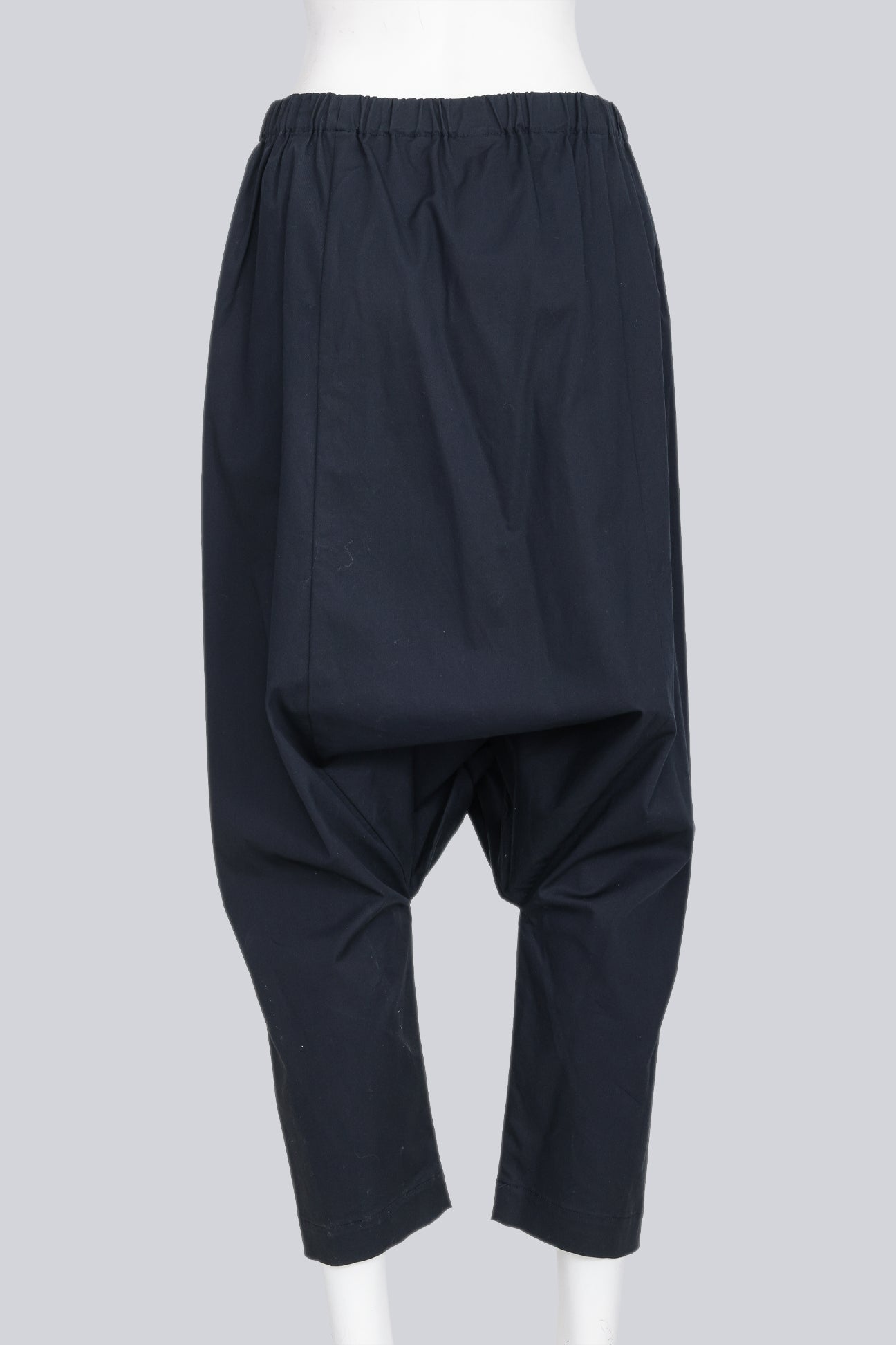 COMME DES GARCONS - A PAIR OF 2014 COTTON BLEND NAVY DROP CROTCH TROUSERS