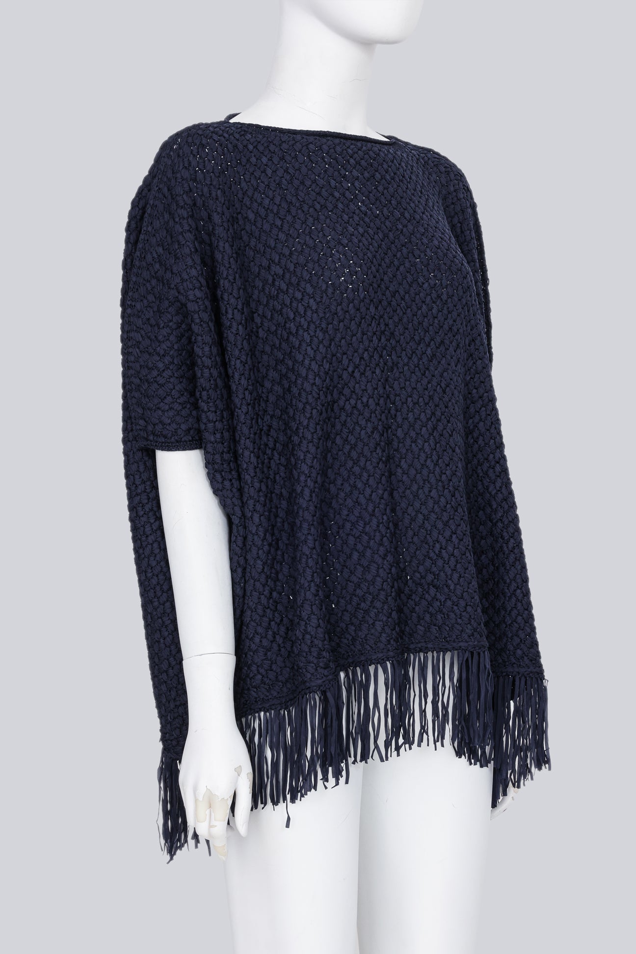 JUNYA WATANABE COMME DES GARCONS - A 2013 NAVY WOVEN PONCHO WITH TASSELS
