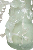A SERPENTINE JADE DOUBLE GOURD VASE AND COVER