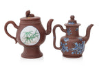 A GROUP OF THREE ENAMELLED YIXING ZISHA TEAPOTS