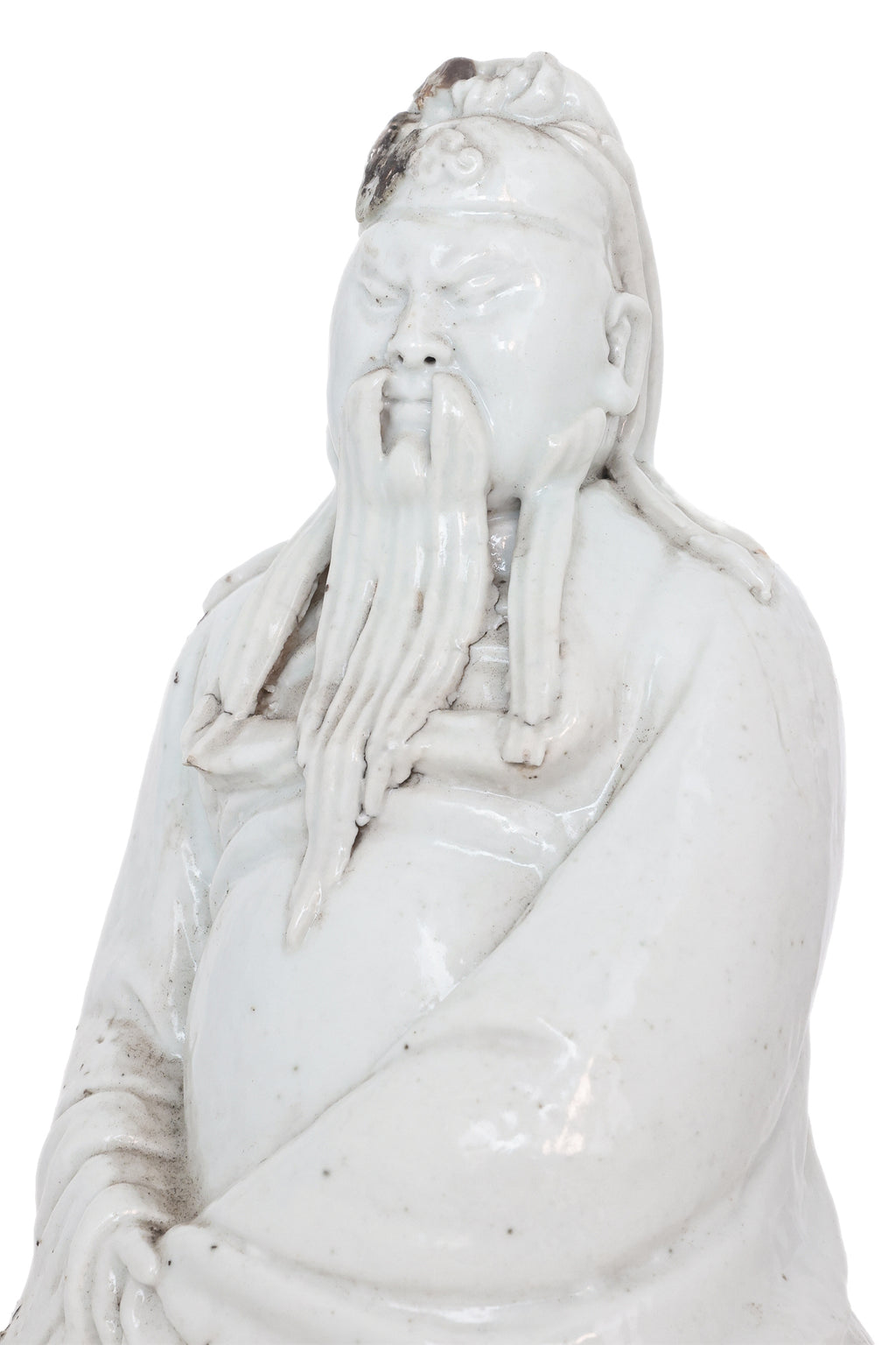 A BLANC DE CHINE PORCELAIN MODEL OF GUANDI