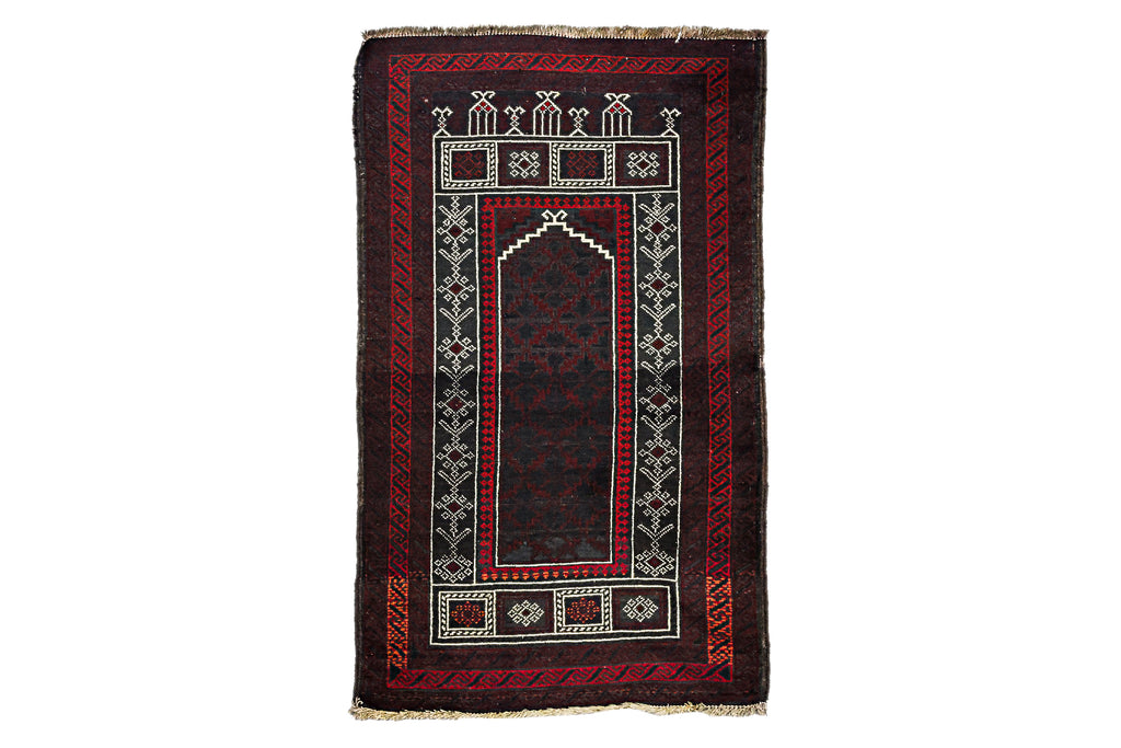 A TRIBAL WOOL PRAYER RUG (136 x 80cm)