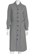 COMME DES GARÇONS - A WOOLLEN HOUNDSTOOTH COAT