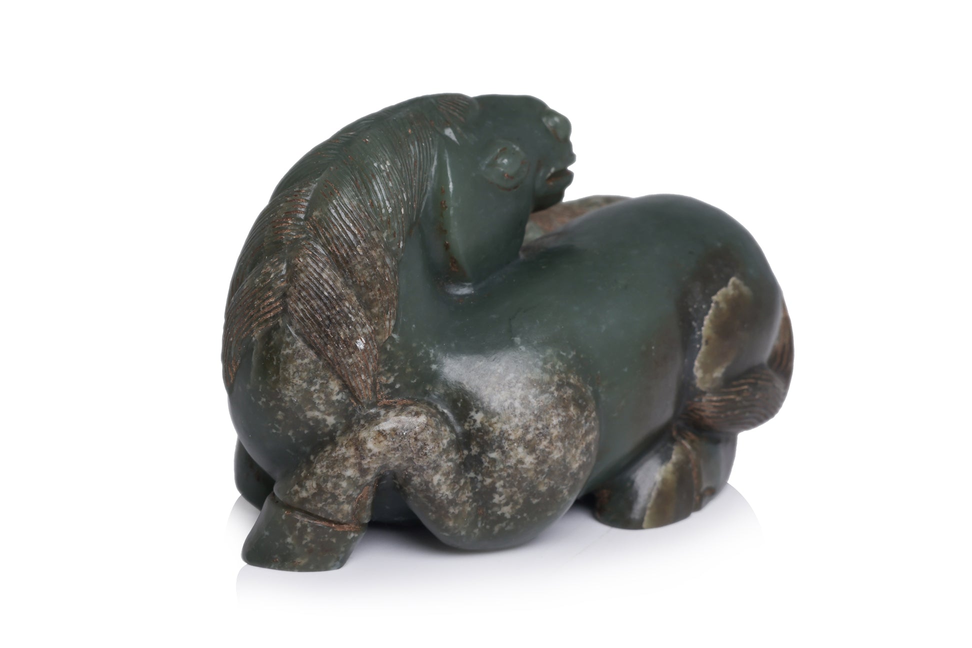 A CARVED GREEN JADE HORSES GROUP