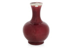 A SANG DE BOEUF GLAZED PORCELAIN VASE