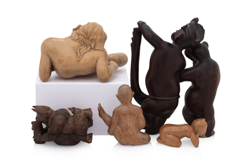 A GROUP OF FIVE BALINESE WOOD CARVINGS
