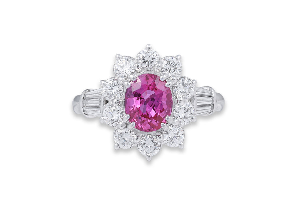 A PINK SAPPHIRE AND DIAMOND CLUSTER RING