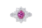 A PINK SAPPHIRE AND DIAMOND CLUSTER RING
