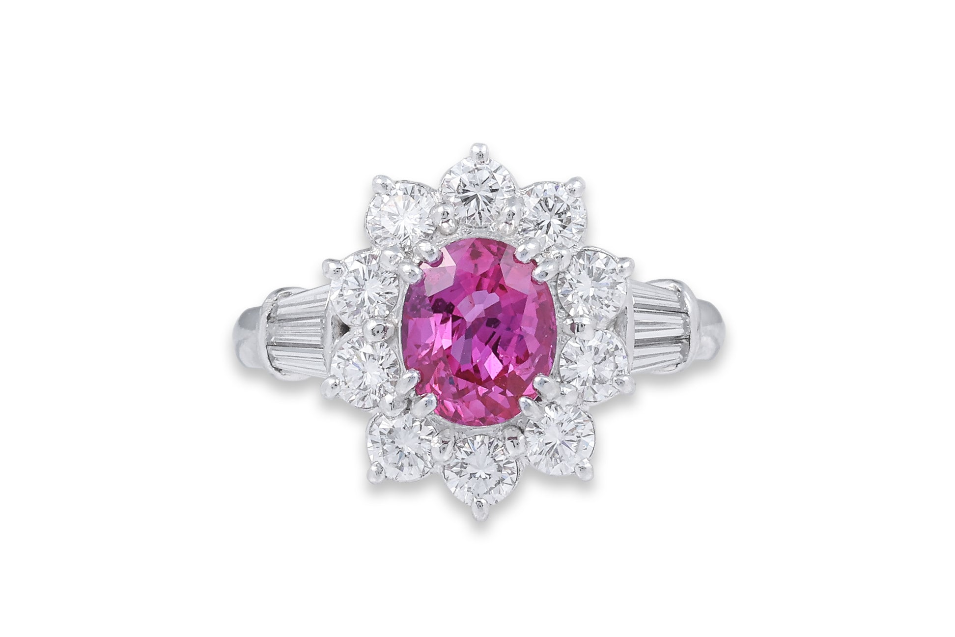 A PINK SAPPHIRE AND DIAMOND CLUSTER RING