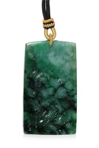 A SPINACH AND GREEN JADEITE DRAGON PLAQUE