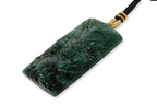 A SPINACH AND GREEN JADEITE DRAGON PLAQUE
