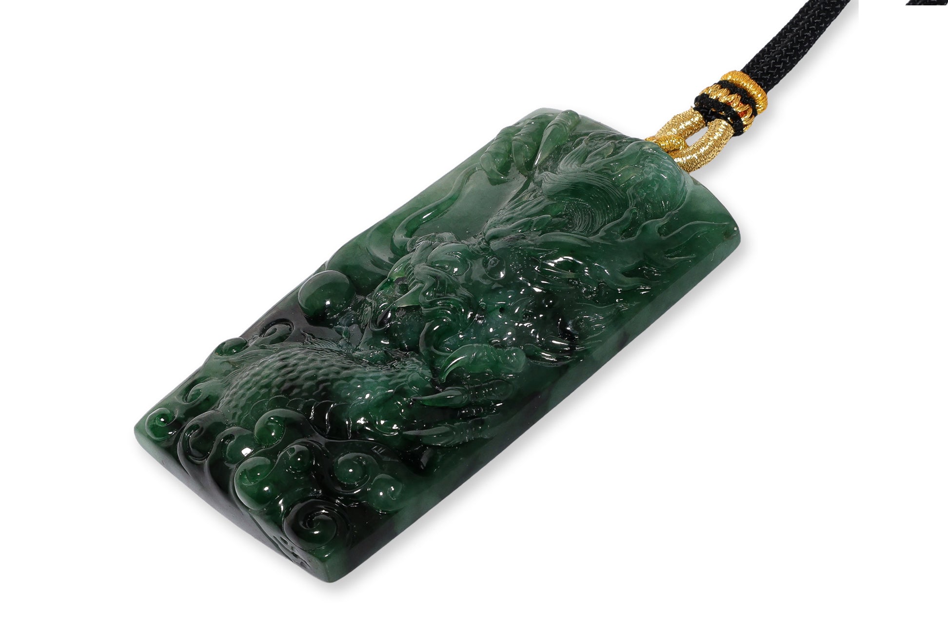 A SPINACH AND GREEN JADEITE DRAGON PLAQUE