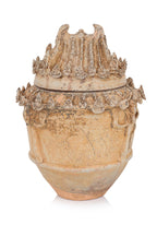 A STONEWARE GRANARY JAR AND COVER