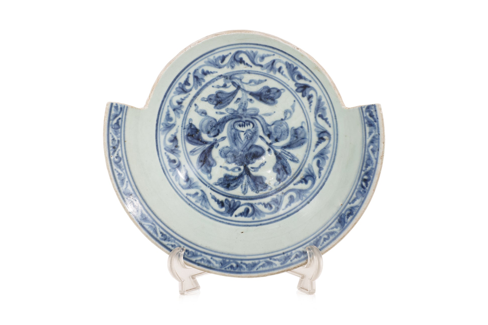 A BLUE AND WHITE LOTUS DECORATED PART-DISH