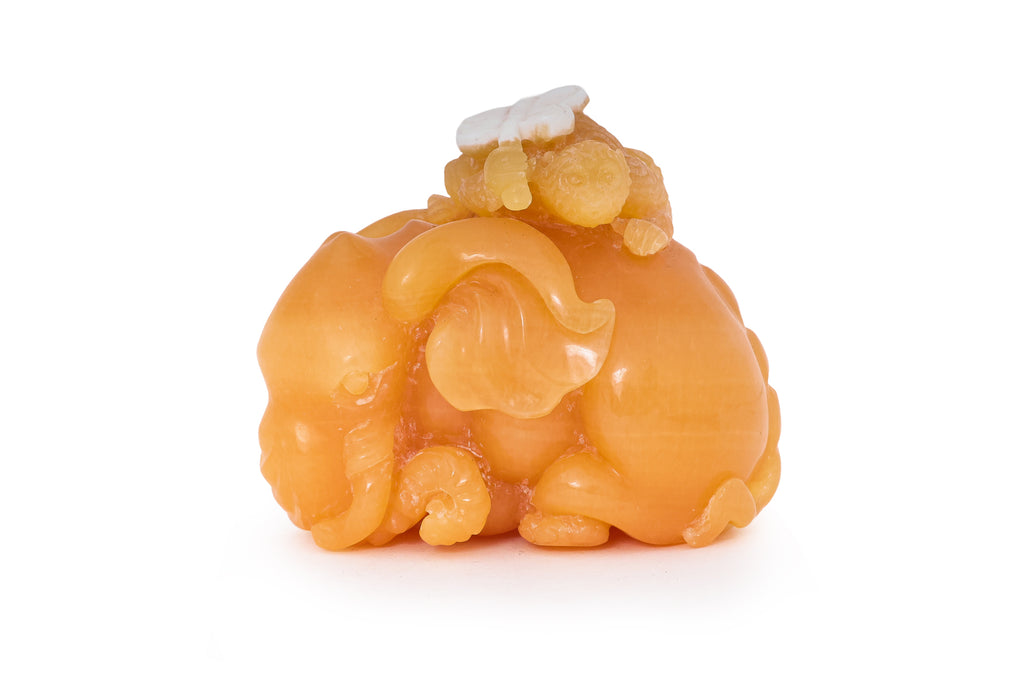 A YELLOW TIANHUANG-TYPE STONE MODEL OF AN ELEPHANT AND MONKEY