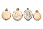 A GROUP OF FOUR PENDANT WATCHES