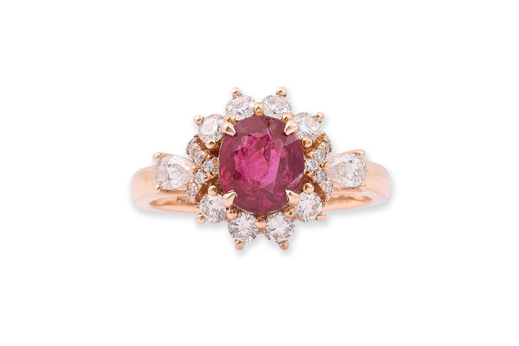 AN UNHEATED VIVID RED BURMESE RUBY AND DIAMOND RING
