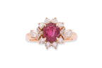 AN UNHEATED VIVID RED BURMESE RUBY AND DIAMOND RING