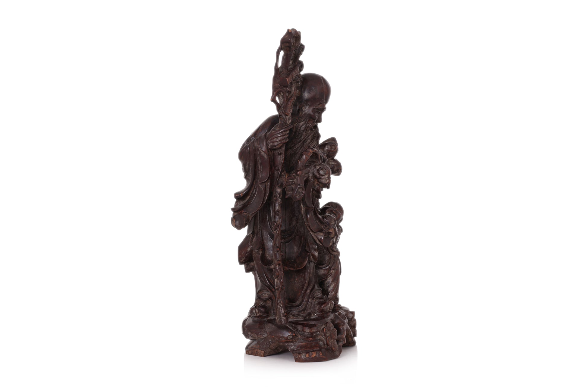 A CARVED HARDWOOD FIGURE OF SHOULAO