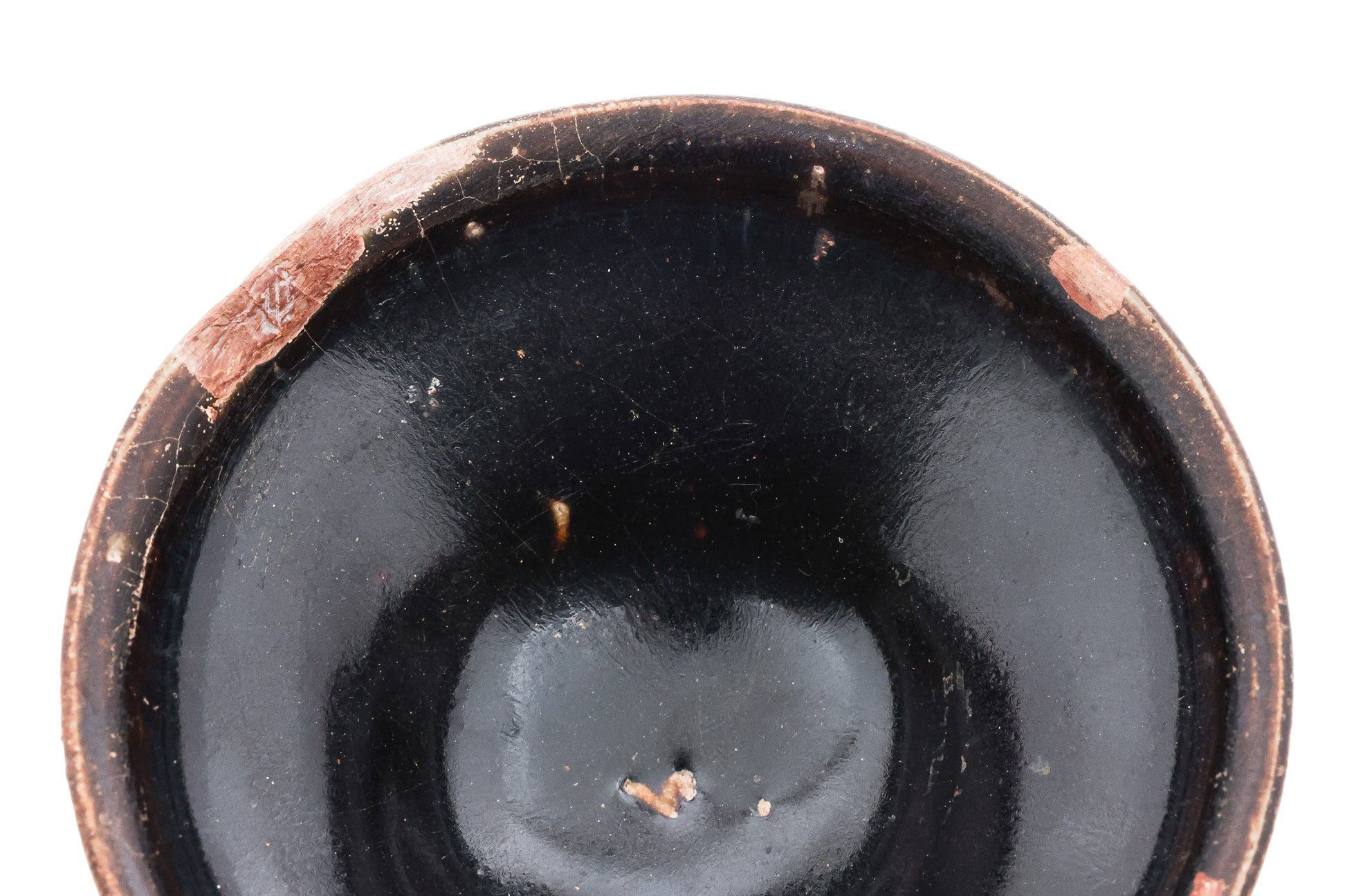 A BLACK-GLAZED STONEWARE BOWL
