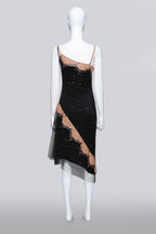 COLLETTE DINNIGAN - A BLACK MESH OVERDRESS WITH SLIP