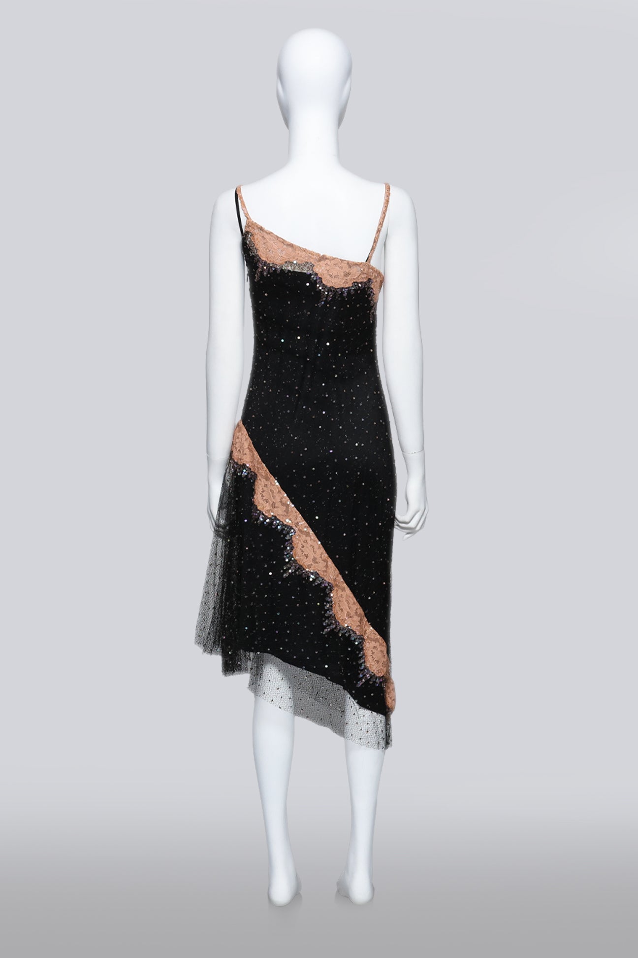 COLLETTE DINNIGAN - A BLACK MESH OVERDRESS WITH SLIP