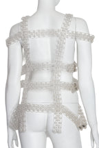 NOIR KEI NINOMIYA FOR COMME DES GARÇONS - A WOVEN PVC VEST, 2017