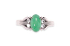 A JADEITE AND WHITE STONE RING